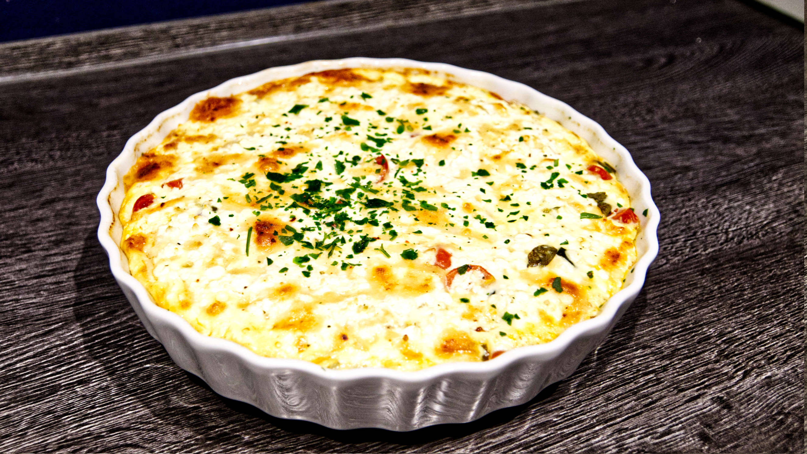 Gemüsequiche in einer Tarteform